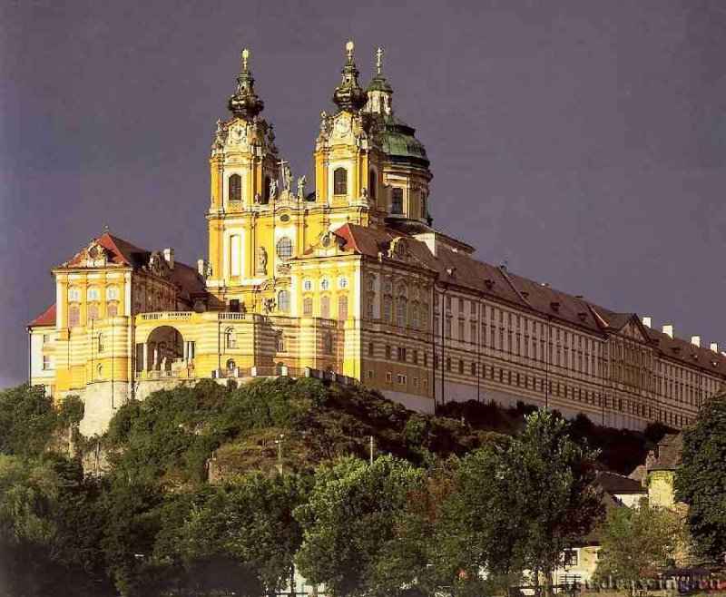 Ансамбль аббатства бенедиктинцев. Вид с Дуная. 1702-1728 - Мельк. Австрия. Комплекс барочных зданий, выстроенный на высокой скале над Дунаем - результат совместной деятельности аббата Бертольда Дитмайра и архитектора Якоба Прандтауэра. Совместно с Йозефом Мунггенастом.