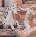 Фонтан Треви. Деталь 1732 - 1751 - Мрамор. Рим. Палаццо Поли. Италия.Кони и управляющие ими тритоны. Фонтан Треви. Деталь фасада палаццо Поли. Эта группа была выполнена Пьетро Браччи, возможно, по наброскам Джованни Баттисты Майни (1690 - 1752).